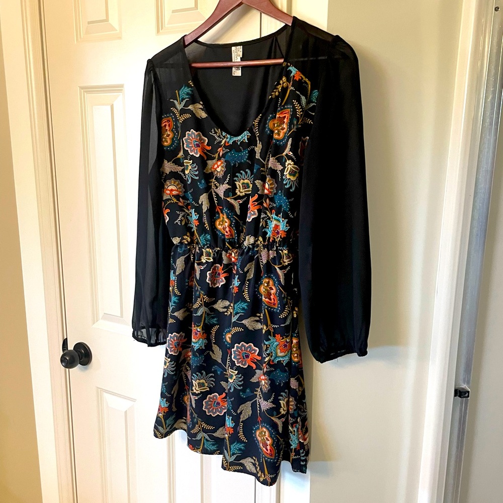 Dress size L, boutique brand.